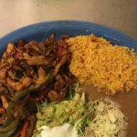Fajitas Dinner · Your choice of chicken, beef, or shrimp sautéed with mixed bell peppers and onions. Served w...