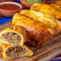 Grass-Fed Beef Empanada · Fresh, grass-fed ground beef, potatoes, onions, garlic and spices. Chimichurri sauce recomme...