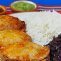Large Empanada Combo · Choose any three empanadas and two sauces, served with black beans and white rice.