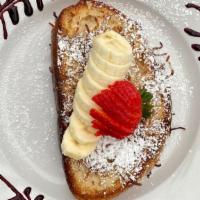 Coconut French Toast | 1 Slice · one slice of coconut french toast | vegan by request