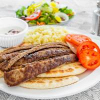 Gyros Plate · Beef and lamb or chicken. Strips of seasoned beef and lamb or chicken served with Greek sala...