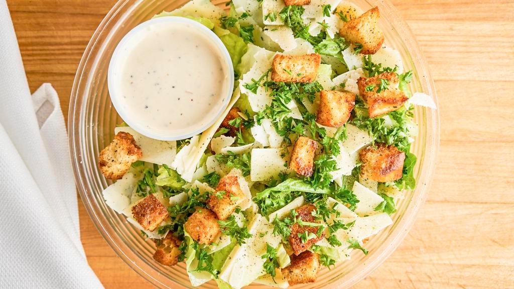 Caesar Salad (Serves 1 (Dinner)) · Fresh romaine lettuce and shreds of parmigiano reggiano topped with crunchy croutons and a creamy Caesar dressing. **extra dressing addition $0.85.