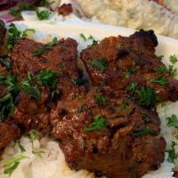Beef Kabob (Soft & Juicy) · Served with rice, hummus, salad, onions, grilled tomato grilled jalapeno. pita bread