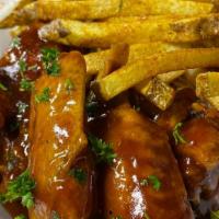 Wings · 8 wings With hand cut french fries ranch dipping sauce 
BBQ
Honey Sriracha
Lemon pepper
Buff...