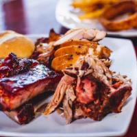 3 Meat 2 Side Plate · Choose your three favorite meats and 2 sides. We smoke our meats in our giant outdoor smoker...