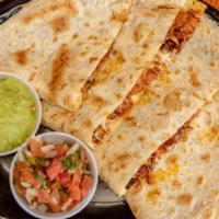 Quesadillas · Tray of ten. Served with guacamole and sour cream.