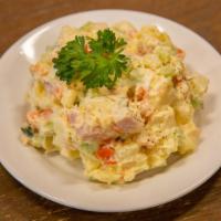 Potato Salad/Niislel Salad · Traditional salad with diced pickled cucumber, cucumber,
carrot, spam, and hard-boiled egg d...