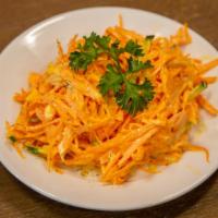 Carrot Salad/Luuvangiin Salad · Shredded carrots dressed in mayo.