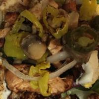 Larry'S Special · Green salad with grilled chicken, wax peppers, jalapeños, onions and mushrooms.