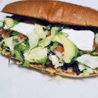Tortas · Has beans lettuce fresh cheese,  pico de gallo, avocado with the meat of your choice