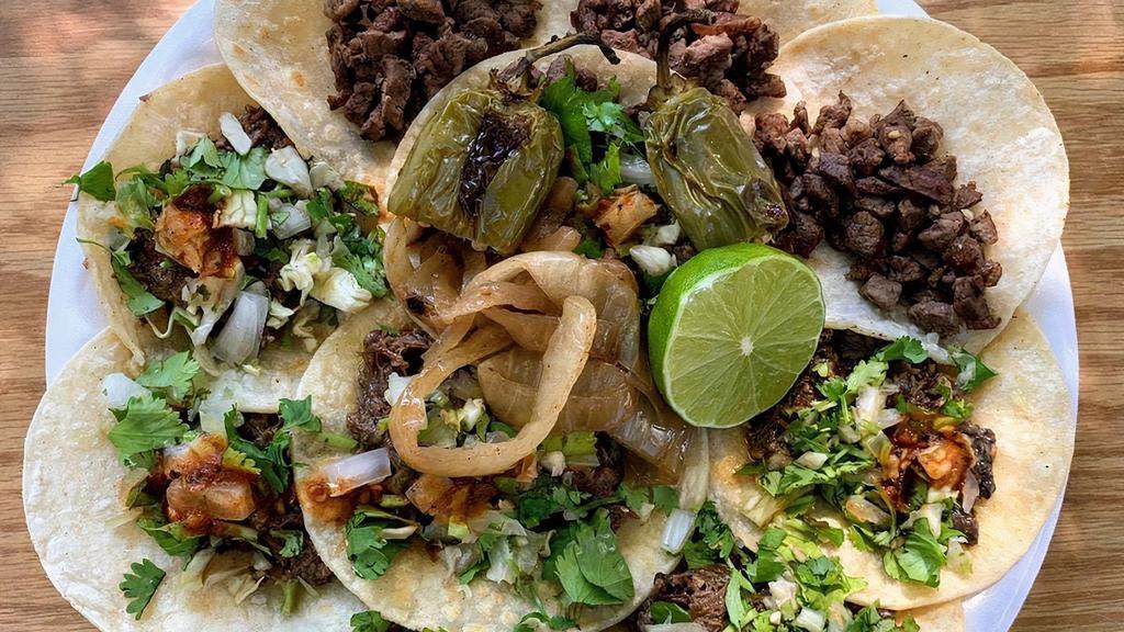 Tacos · Regular sized street tacos with veggies !!