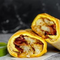 Bacon, Egg, And Cheddar Burrito · 3 fresh cracked cage-free scrambled eggs, melted Cheddar cheese, smokey bacon, crispy potato...