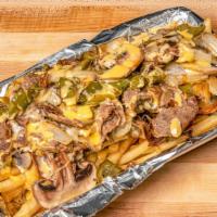 Philly Fries · French fries topped with your choice of steak or chicken, grilled onions, bell peppers, mush...