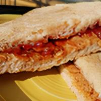Almond Butter & Jelly Sandwich (V) · Organic Almond butter or peanut butter with a berry jam on sourdough toast.