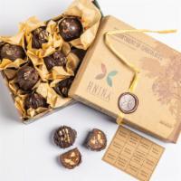 Raw Chocolate Truffles Assortment Box  (12 Rock) · Vegan raw. Allergen statement:  Contains nuts and tree nuts.  May contain pieces of shells.
...