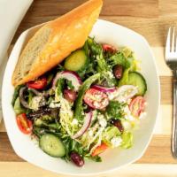Mediterranean Greek Salad · Mixed greens, cucumber, onions, kalamata olives, tomatoes and feta Cheese. Serves with balsa...