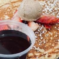 Oatmeal Griddle Cakes · Homemade maple brown sugar oatmeal griddle cake with sweet maple butter. Strawberries.