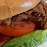 Grilled Chicken Sandwich · Grilled chicken sandwich: slices of marinated grilled chicken thigh, 2 Sunnyvale bacon strip...