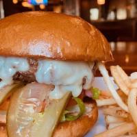 Prime Cut Cheeseburger · Fresh house ground angus chuck burger, classic toppings, white cheddar and house made burger...