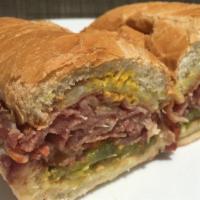 Pastrami · Pastrami with mustard, pickles, and provolone cheese.