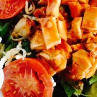 Buffalo Chicken Salad - Medium · Fresh crisp romaine topped with grilled chicken, dipped in buffalo hot sauce, onions, cucumb...