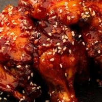Sweet & Spicy Calabrian Chile Wings · Seven wings tossed in our house made Sweet & Spicy Calabrian Chile sauce and sesame seeds. S...