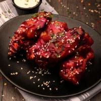 800° Bbq Wings · Seven wings tossed in our classic sweet BBQ sauce and sesame seeds. Served with your choice ...