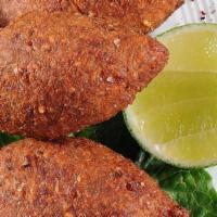 Kebbeh Makliyeh · Fried ground beef and burgul croquettes, stuffed with minced beef, onion and pine nuts.
