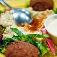 Falafel With Babaganouj · 4 pieces of Falafel served with babaganouj and tahini sauce.