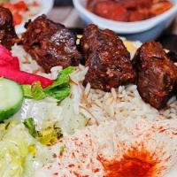 Lamb Kebab Plate · Lamb kebab with hummus, rice and lebanese salad. Naturally raised without the use of hormone...