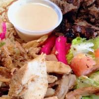 Mixed Shawarma · Chicken & beef shawarma with rice, tahini and lebanese salad. Naturally raised without the u...