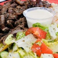 Beef Shawarma Plate · Beef shawarma with rice, tahini and lebanese salad. Naturally raised without the use of horm...