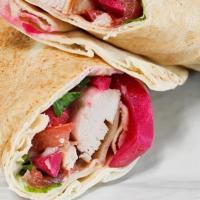 Shish Tawook (Chicken Kebab) Wrap · Garlic sauce, lettuce, tomato and turnip. Naturally raised without the use of hormones or an...