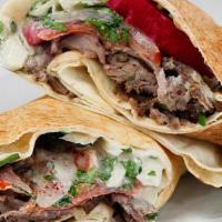 Beef Shawarma Wrap · Parsley, onion, tomato, turnip, sumak and tahini sauce. Naturally raised without the use of ...