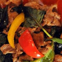 Red Curry · Bamboo shoot, bell peppers, basil, and choice of meat or tofu in coconut red curry. Served w...