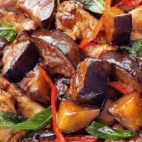 Pad Ma Kur-Kai Dow · Stir fried Chinese eggplant, bell peppers, basil, and choice of meat or tofu in mild spicy r...