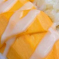 Sticky Rice With Mango · Thai dessert made with sweet rice, fresh ripe mango and coconut milk