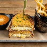 Gastrobar Grilled Cheese · creamy herb cheese, triple stacked with Tillamook™ white. cheddar, mozzarella and provolone ...