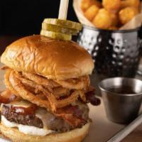 Bourbon Bbq Burger · Louie’s custom burger blend, cooked medium-well, applewood smoked bacon, cream cheese, Tilla...