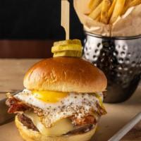 All Nighter · Louie’s custom burger blend, cooked medium-well,     sunny egg, house-made spicy candied bac...