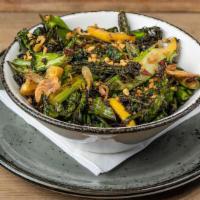 Side Roasted Broccolini · roasted broccolini, charred lemon, crispy garlic & shallots, chili flakes