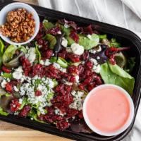 Cali Bleu Salad · A mix of field greens tossed with dried cranberries, bleu cheese crumbles, caramelized pecan...