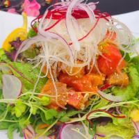 Sashimi Salad · Mixed green, romaine, fuji apple, radish, beet, seaweed, masago, gobo. Served with sesame dr...