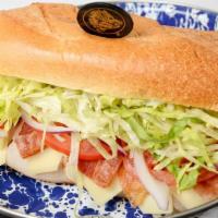 Turkey Club House · Turkey breast, bacon, Swiss cheese, lettuce, tomato, onion, honey mustard.