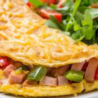 The Greek Omelet · Delicious omelet made with cage-free eggs, feta cheese, fresh spinach, diced tomatoes, red o...