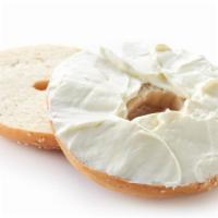 Bagel · Fresh multigrain bagel toasted with cream cheese on the side.