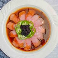 Pepper Fin · Sliced sashimi‏ style white fish with sweet and spicy sauce topped with jalapenos and tobiko.