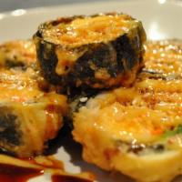Samurai Roll · Deep fried shrimp, snow crab, avocado, salmon, scallop with special sauce.