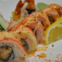 Ninja Roll · Deep fried shrimp, snow crab roll, avocado on top with creamy peanut butter sauce.