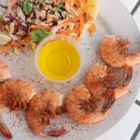 Peel And Eat Shrimp · 1/2 pound of key west pinks boiled in Cajun spice served with drawn butter, cocktail sauce a...